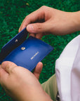 Open coin compartment in the blue full grain leather Ed Classic wallet.