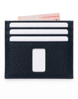 Rear of navy Ed Classic pebble-grain leather slim wallet with white cards and a Singapore note