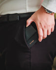 Black ED Classic slim wallet held in hand showing its compact side profile