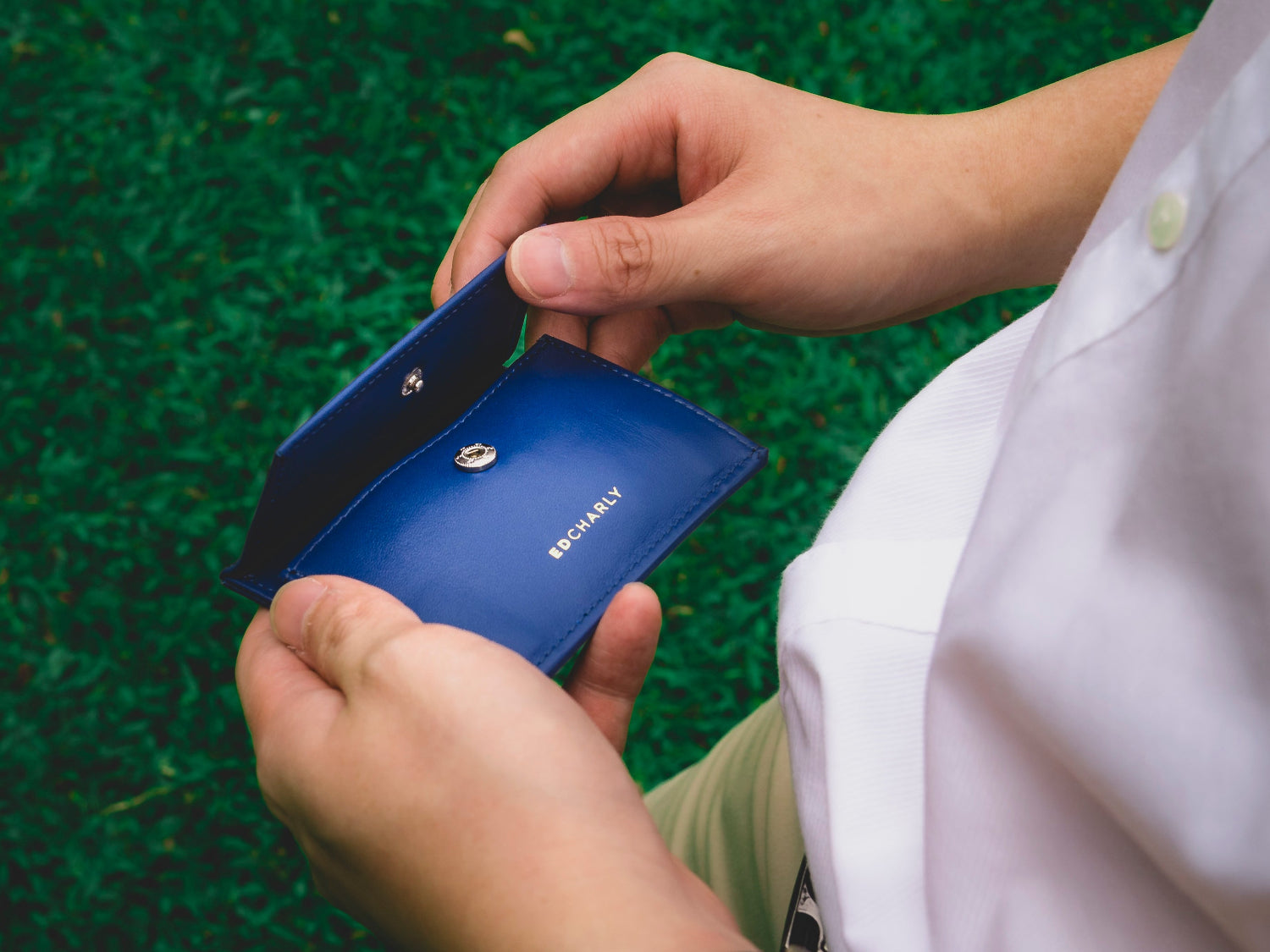 Open coin compartment in the blue full grain leather Ed Classic wallet.