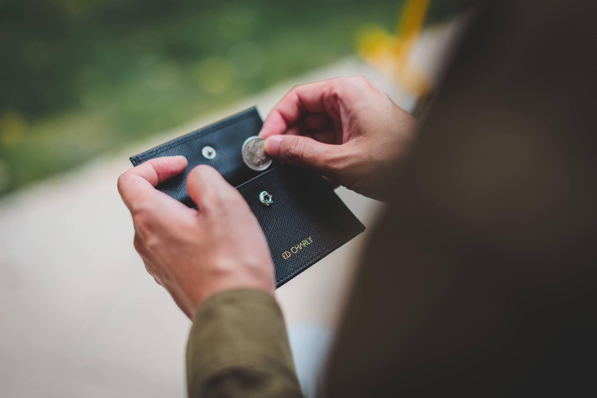 Open Ed Classic Saffiano wallet showing coin compartments