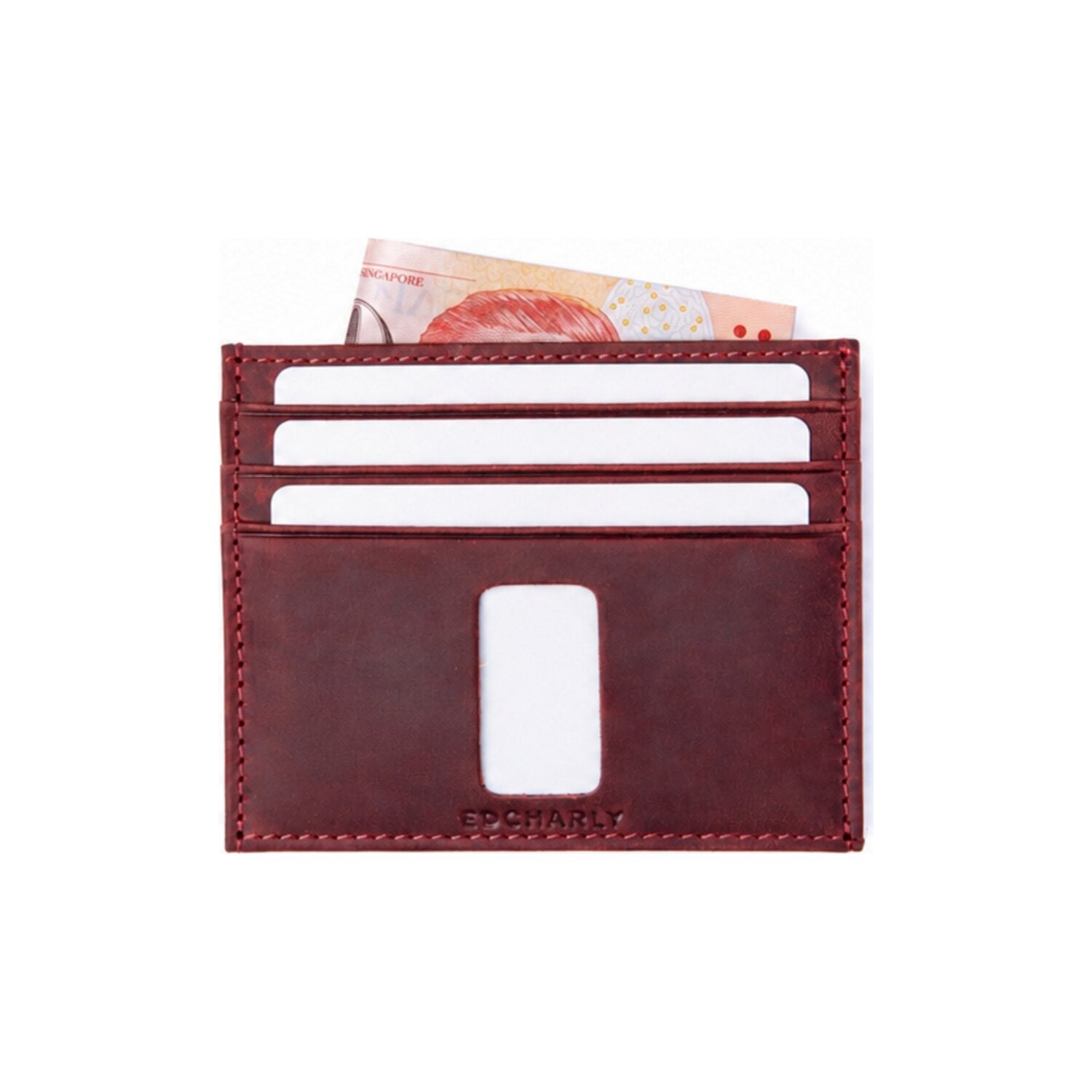 Red Ed Contemporary Crazy Horse leather card holder with white cards and Singapore banknote